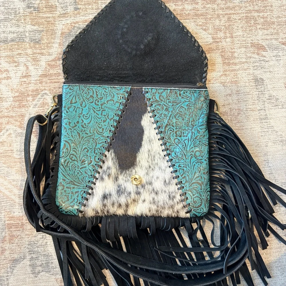 Turquoise Accent Cowhide Tooled Fringe Crossbody Bag - Picture 4 of 9